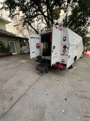 Magnet Plumbing service vehicle on-site for Grease Trap Cleaning in Lummus Park